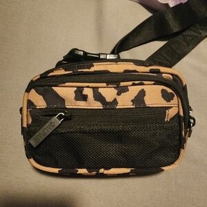 Calpak Stevyn in cheetah print